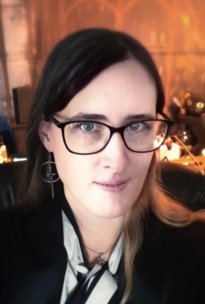 Cadi Gwiddon in her night-sect consultation space.